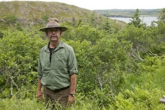 Researcher Looking for Petroglyphs, Newfoundland and Labrador